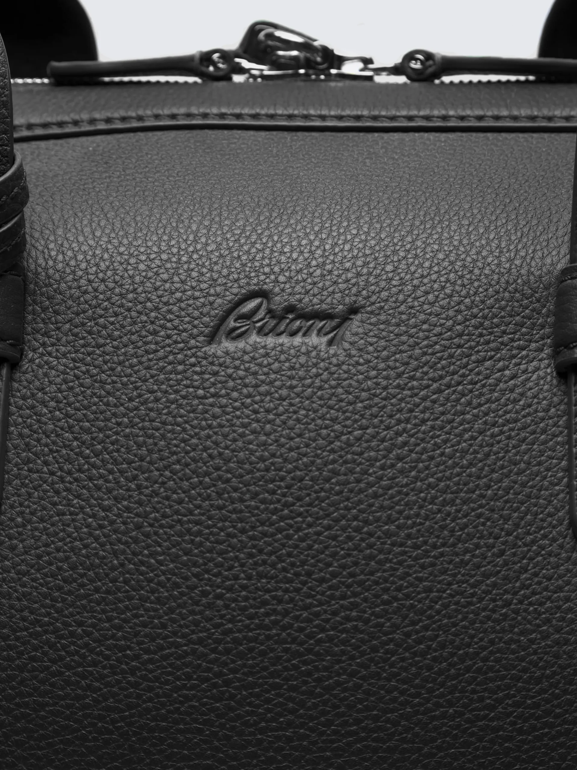 Black grained leather duffle bag