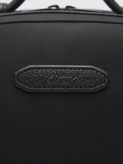 Black nylon and grained leather backpack