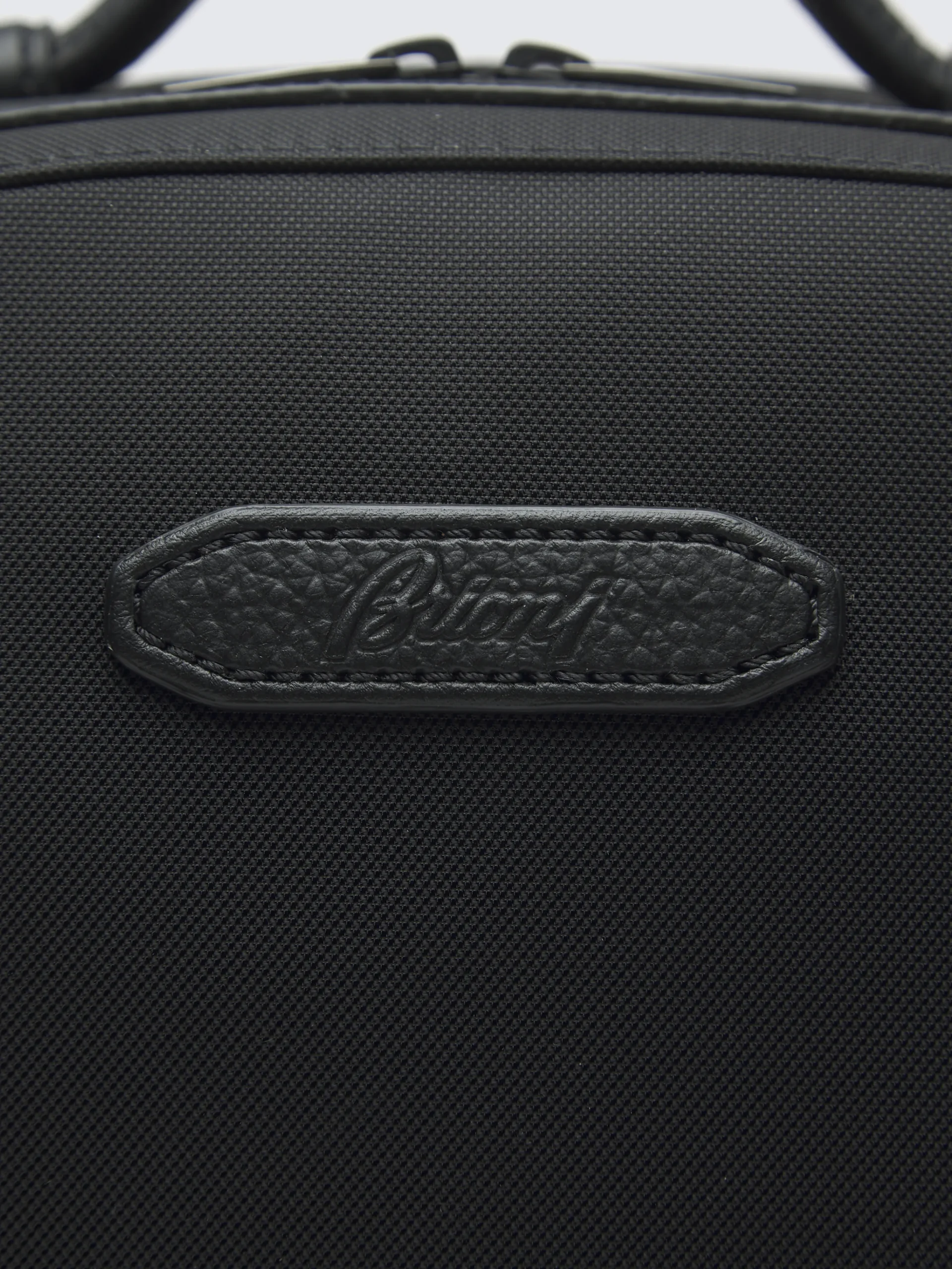 Black nylon and grained leather backpack