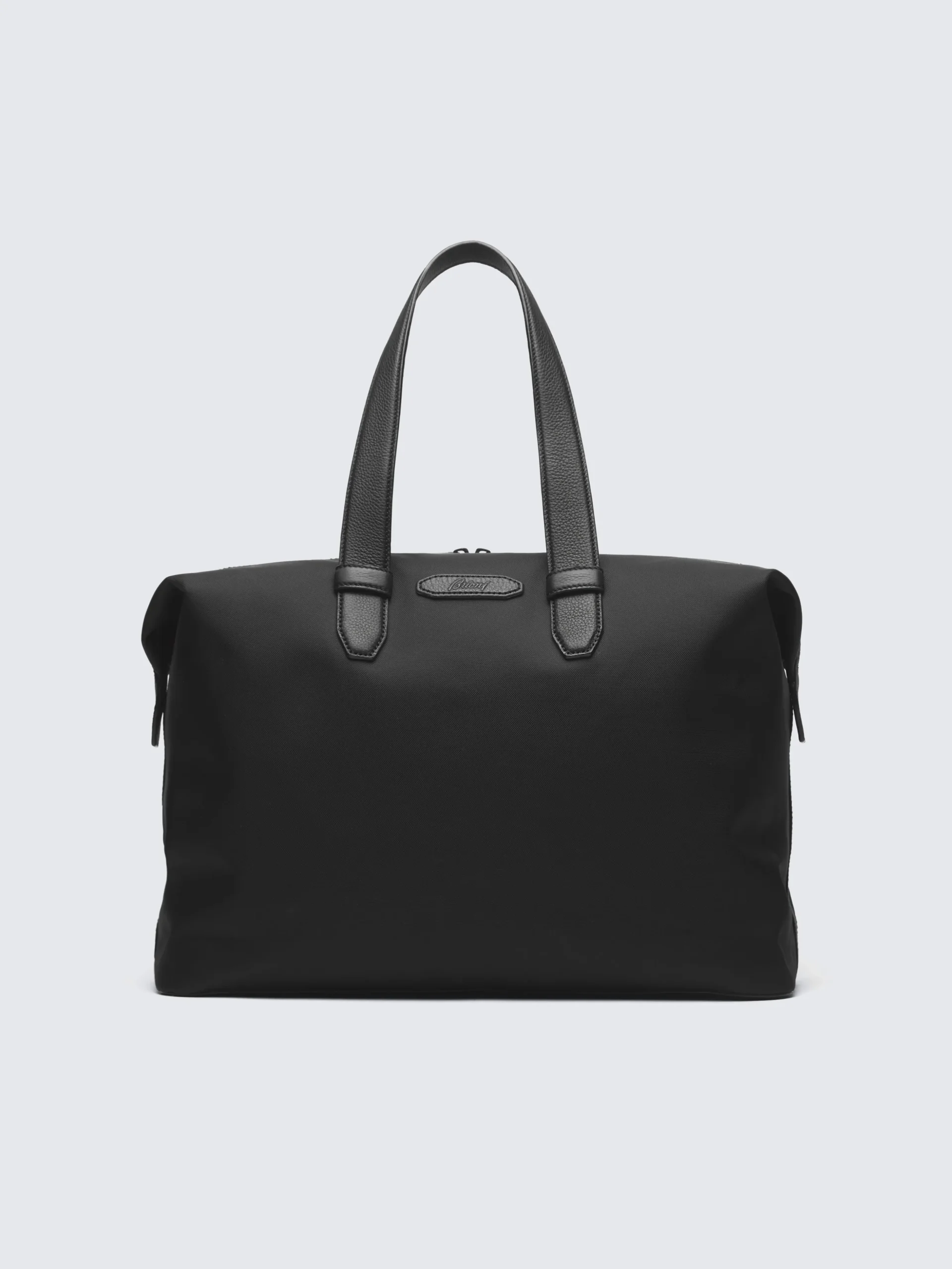 Black nylon and grained leather city bag