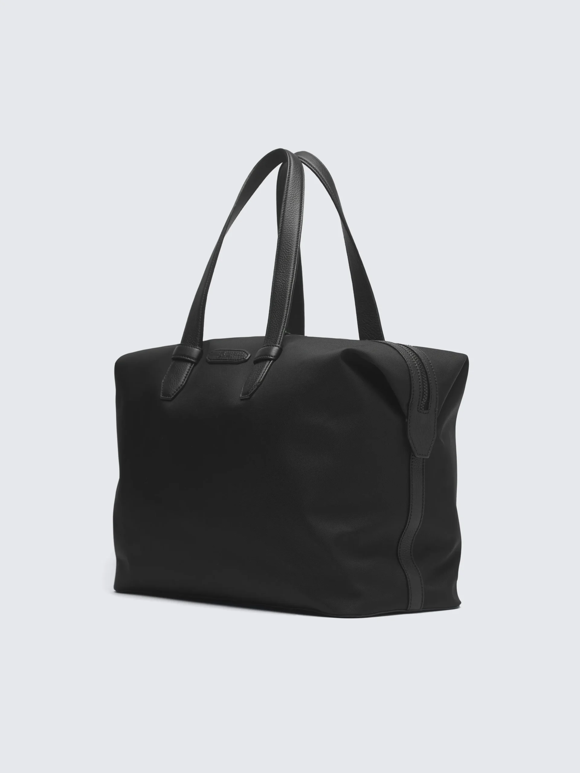 Black nylon and grained leather city bag
