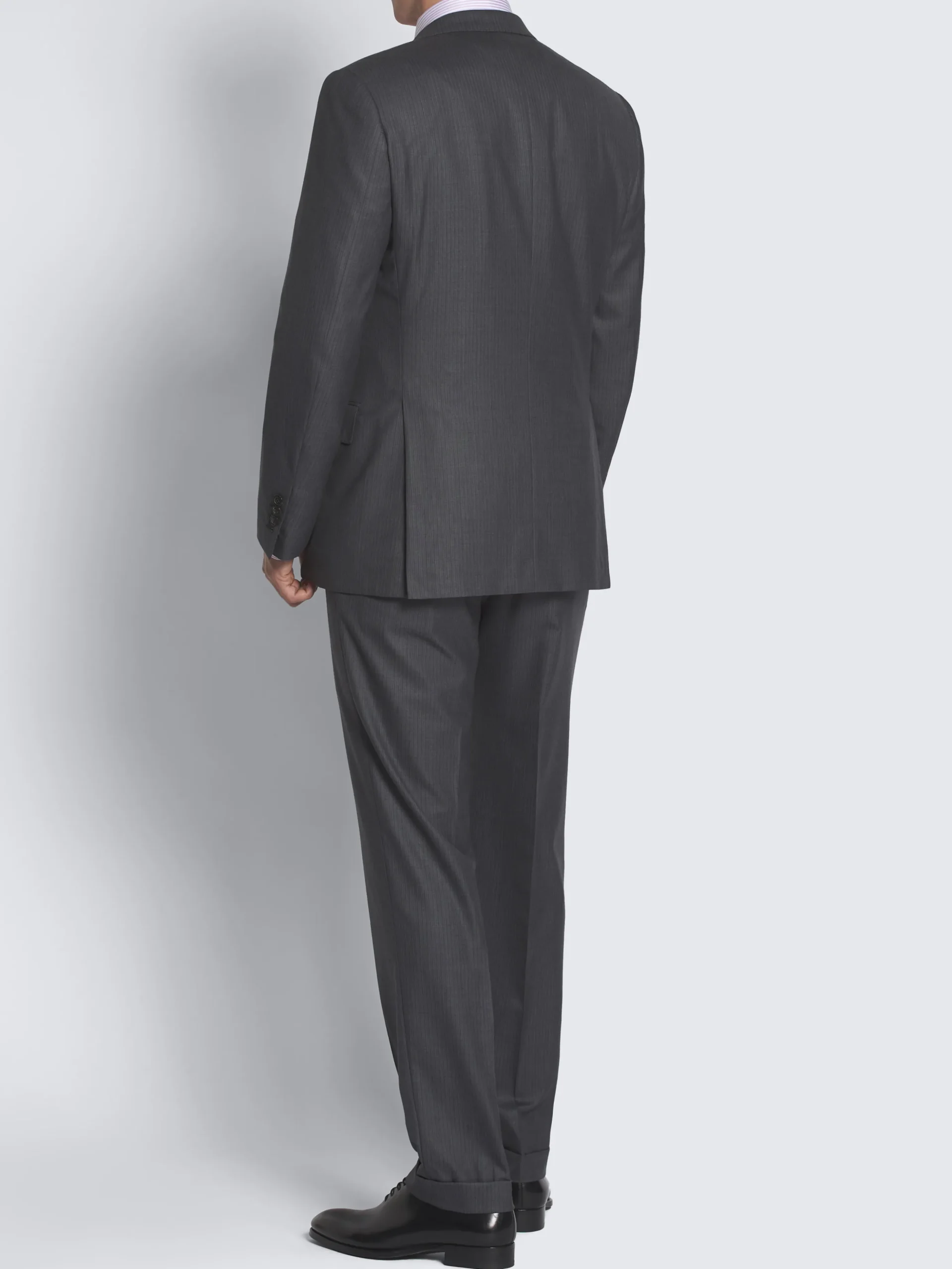 Charcoal grey pinstriped herringbone Utopia Super 220's wool Brunico suit