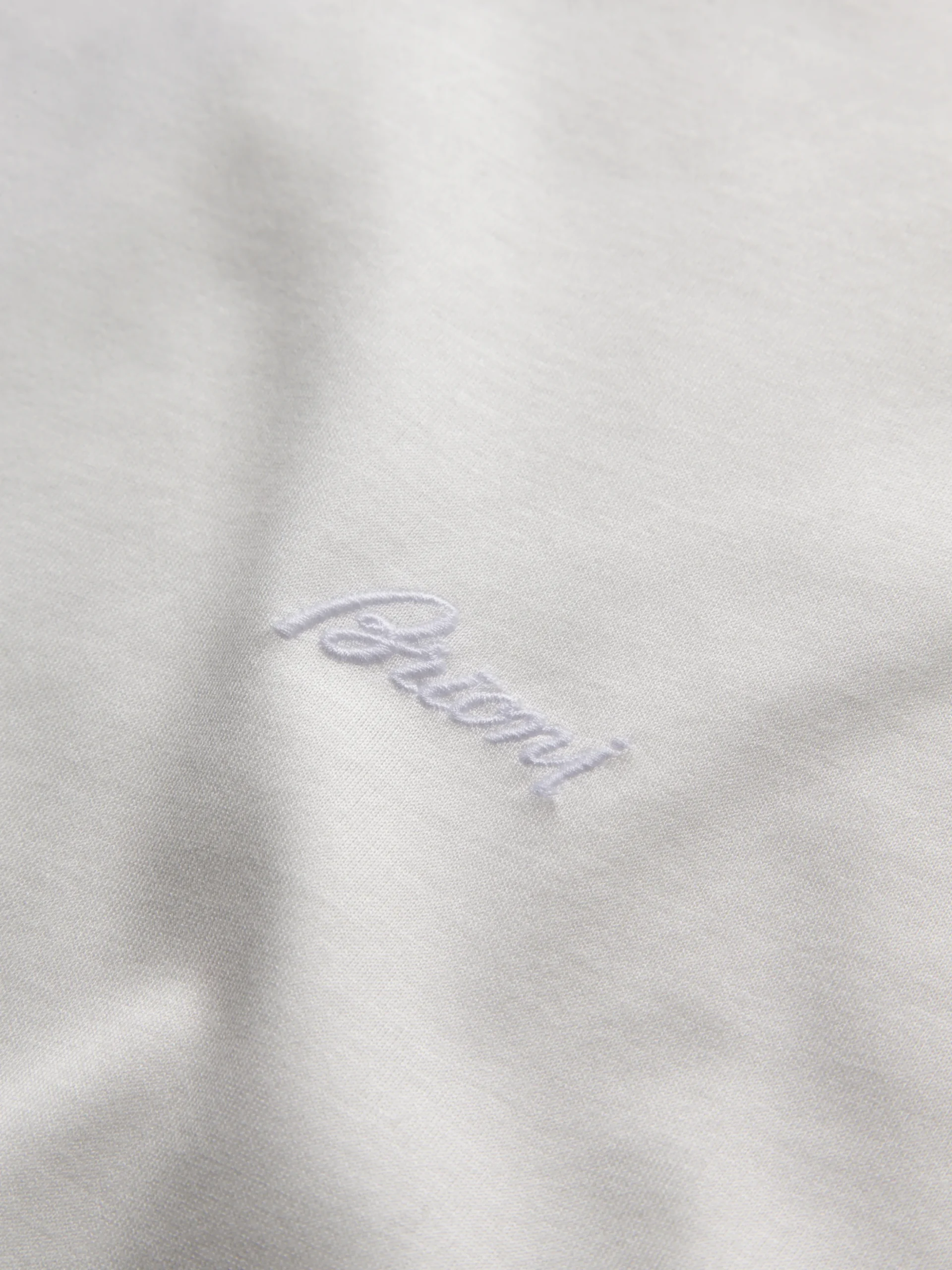 Ivory white cotton zip polo